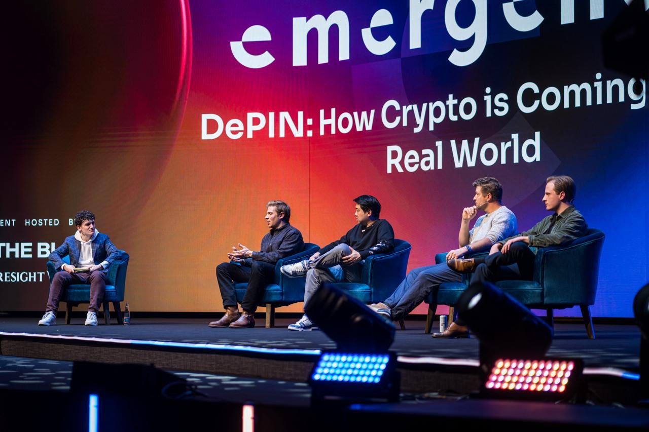 Zack Abrams moderating the DePIN panel at Emergence in Prague